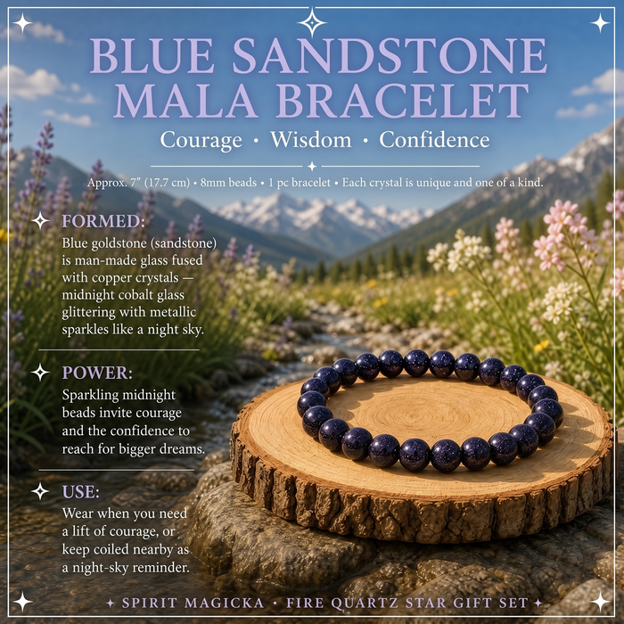 A midnight blue sandstone bead bracelet glittering with tiny sparkles on a wood slice
