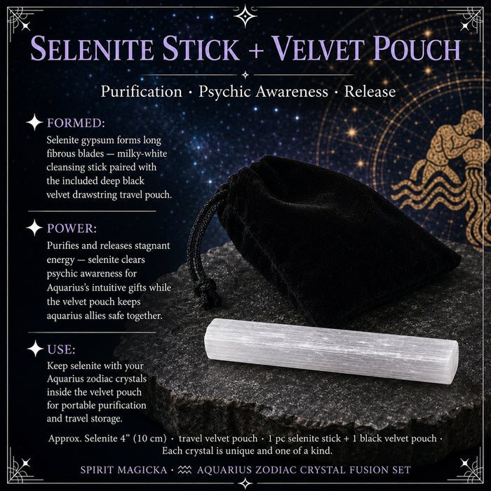 Milky-white selenite stick lying in front of a black velvet drawstring pouch