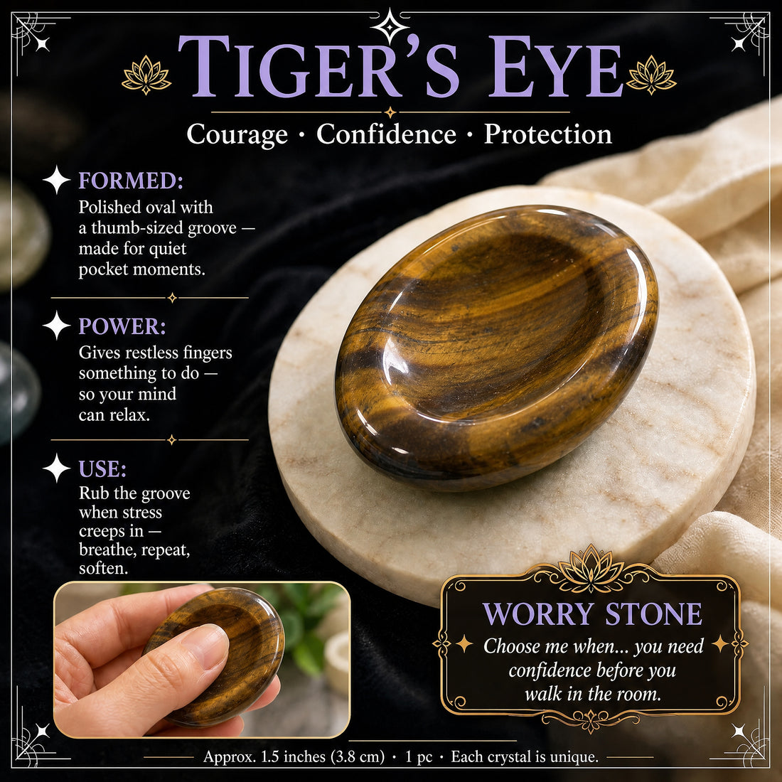 Polished tiger’s eye worry stone with golden-brown bands on a marble coaster, with an inset of a thumb resting in its oval groove